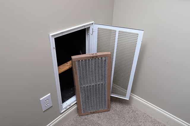 Filter replacement for air intake duct in upstairs hallway.